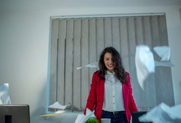 istock Beautiful girl in the office 1203054550