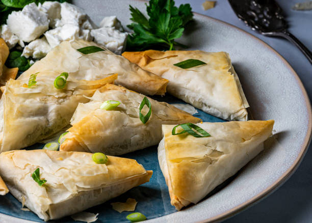 istock Baked Greek spanakopita triangles 1203056334