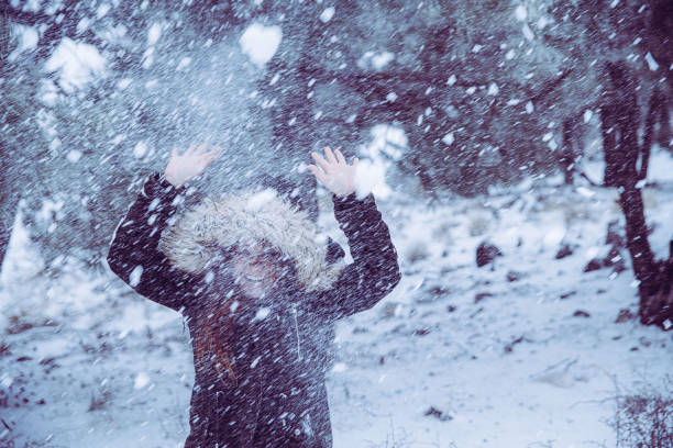 A girl having fun in the snow