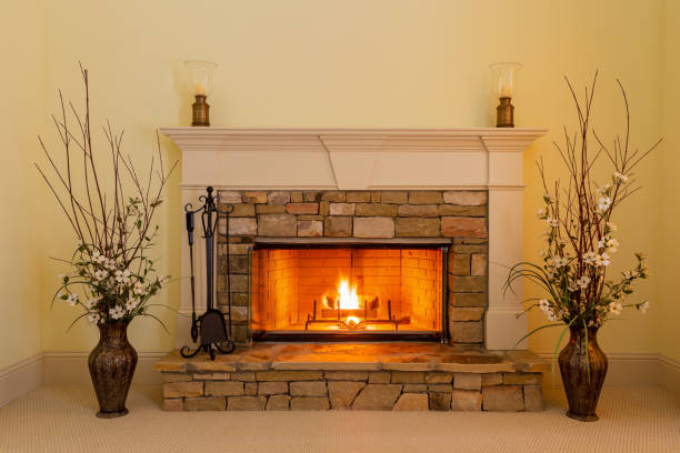 istock Romantic evening by an elegant stone fireplace. 1203066745