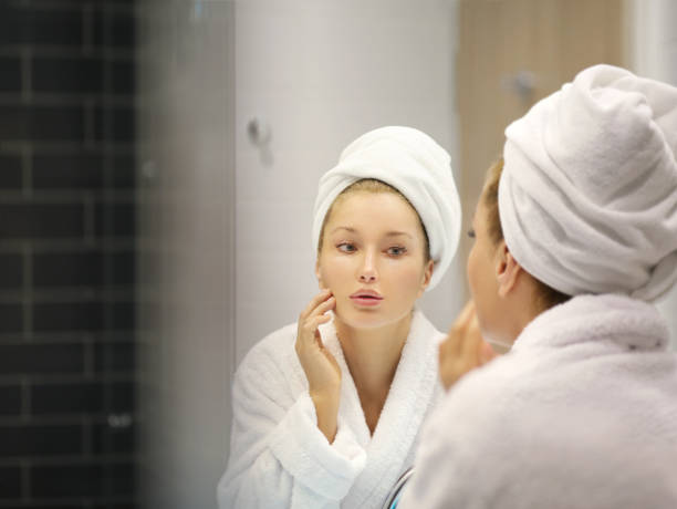 istock Magic anti-aging cream.Applying the cream 1203067461