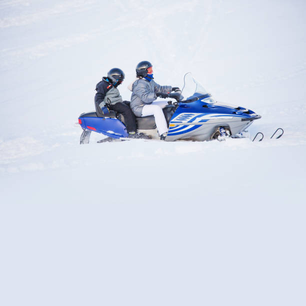 istock Driving snowmobile in Colorado, USA 1203068601