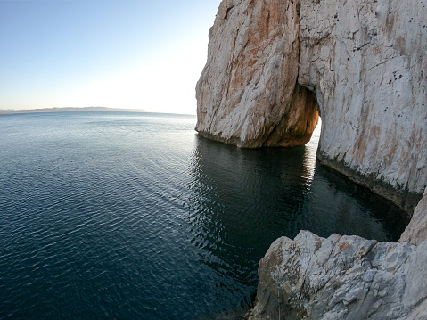 Natural arch over the Mediterranean sea
