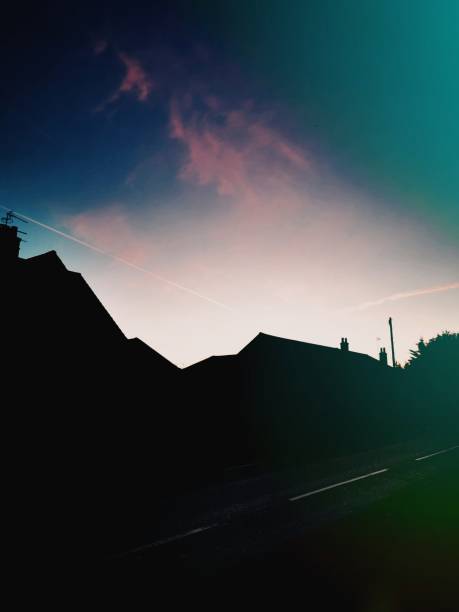 istock Dawn morning sunrise with silhouette and color clouds 1203069961