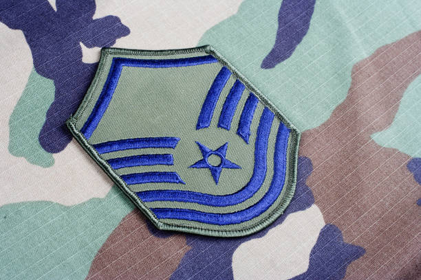 istock US AIR FORCE Master Sergeant rank patch on woodland camouflage uniform 1203072166