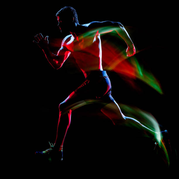 istock topless muscular man runner. running jogger jogging isolated black background 1203077487