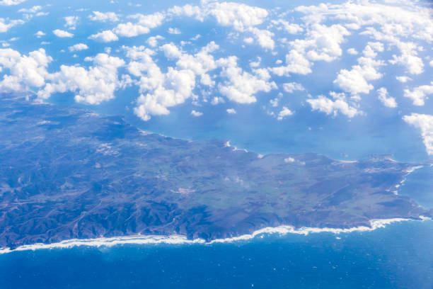 Beautiful aerial view through the airplane window of Cape St. Vincent (Portuguese: Cabo de Sao Vicente), Algarve region, southern Portugal