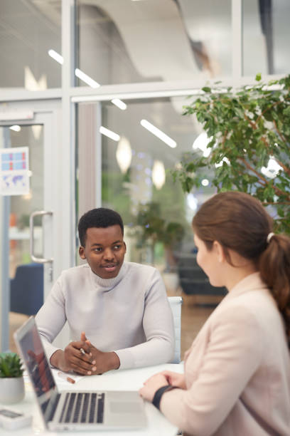 istock Two Young Business People in Meeting 1203080810