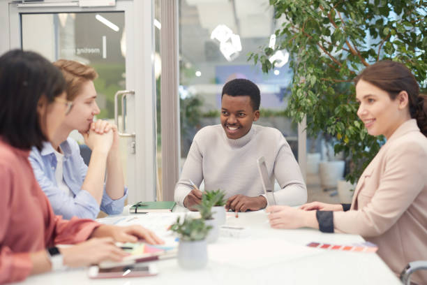 istock Young Business People in Meeting 1203080813