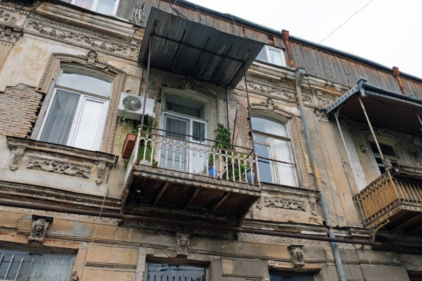 istock Old balconies on historic buildings 1203081939