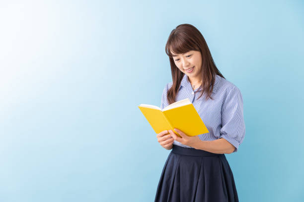 istock woman who reads a book 1203087782