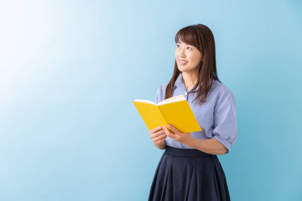 istock woman who reads a book 1203087866