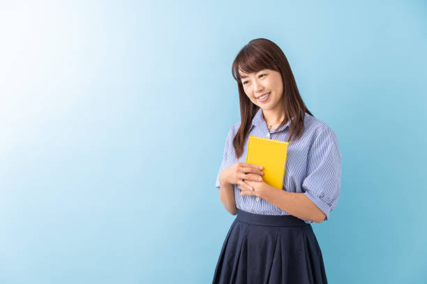 istock woman who reads a book 1203087878