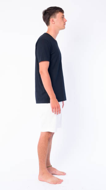 istock Full body shot profile view of young handsome man 1203091632