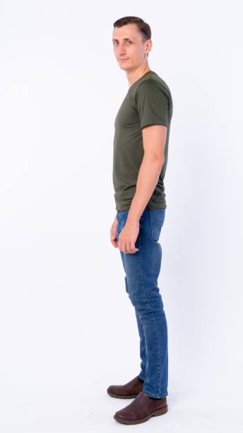 istock Full body shot profile view of man looking at camera 1203091949