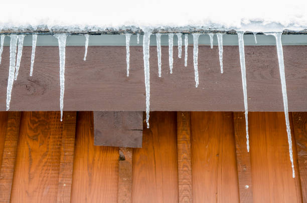 istock Icicle melting from house rooftop 1203092337