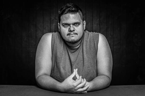 istock Black and White Angry Latino Man 1203096446