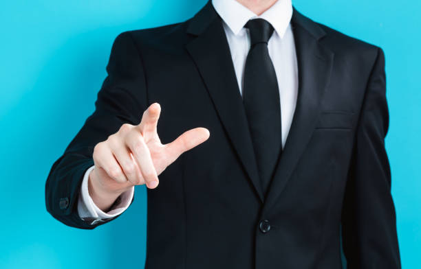 istock Businessman pointing his finger 1203097599