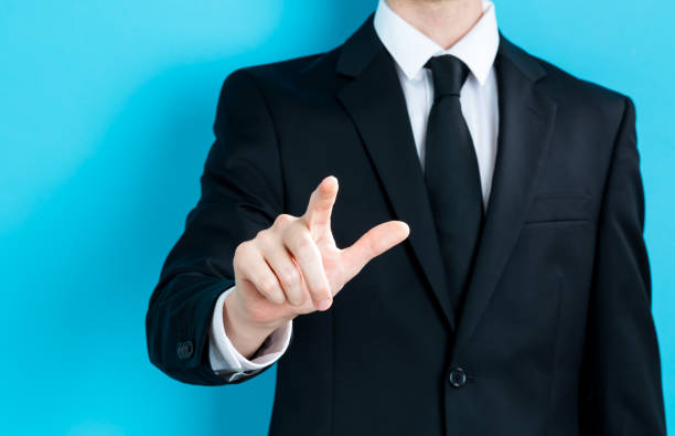 istock Businessman pointing his finger 1203097605