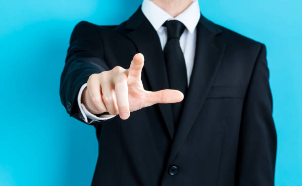 istock Businessman pointing his finger 1203097618