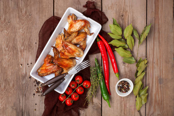 istock Chicken wings and spices. Selective focus. Top view. Copy space 1203100020