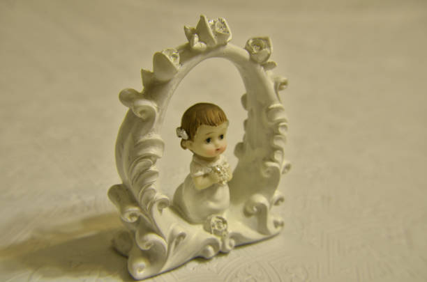 istock praying little girl 1203106524