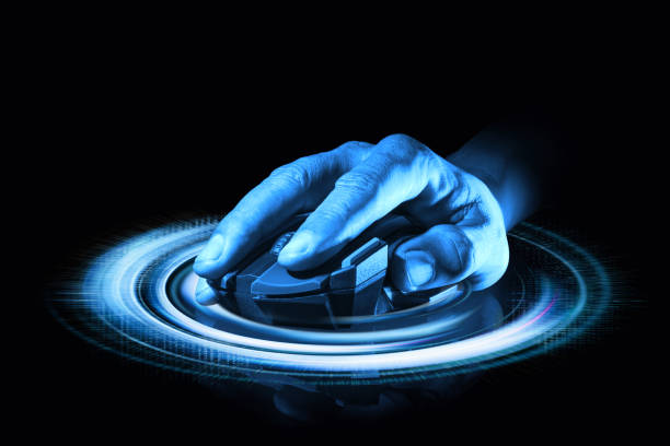 istock Human Hand on gaming mouse over the High technology light Concept 1203107949
