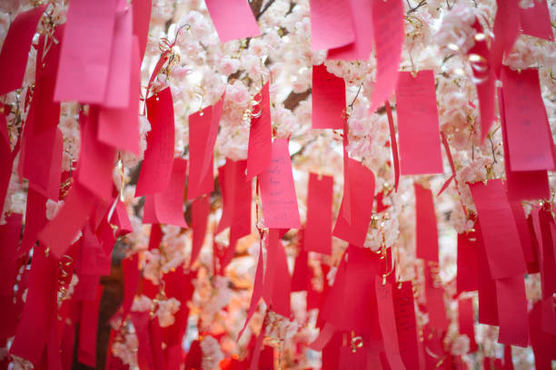 istock Hand-written tags showing wishes for the new year 1203109903