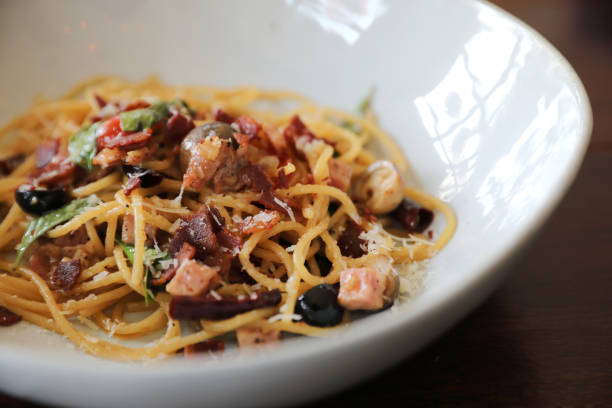 istock Dried Chili and Bacon Spaghetti on wood background 1203111001