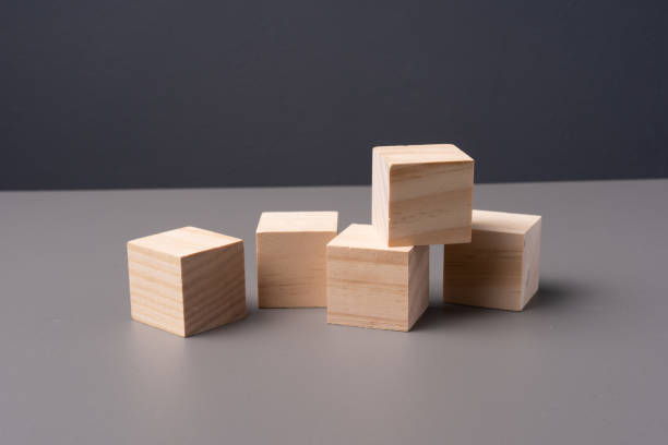istock Wooden blocks arranged on a table with copy space 1203117593