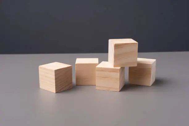 Wooden blocks arranged on a table with copy space