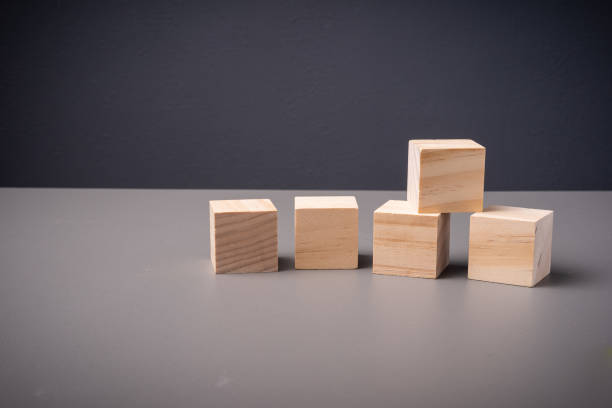 istock Wooden blocks arranged on a table with copy space 1203117606
