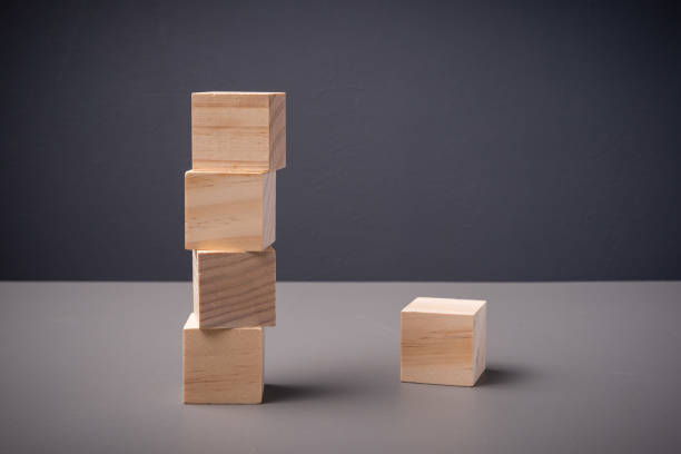 istock Wooden blocks arranged on a table with copy space 1203117615