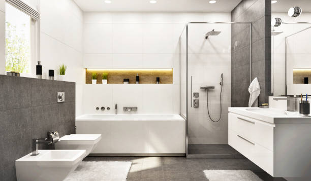 современная белая ванная комната с ванной и окном - tiled floor ceramic floor model home стоковые фото и изображения