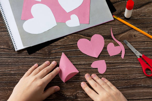 istock Step 4 instruction. Greeting card with mouse heart congratulation. Children's art project crafts for children. Craft for children. 1203122308