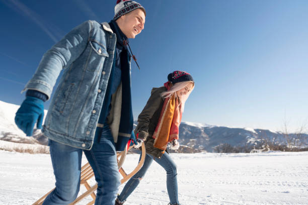 istock Sledding And Childish Happiness 1203130941
