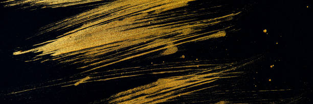 istock Golden curved lines on a black background. 1203131144