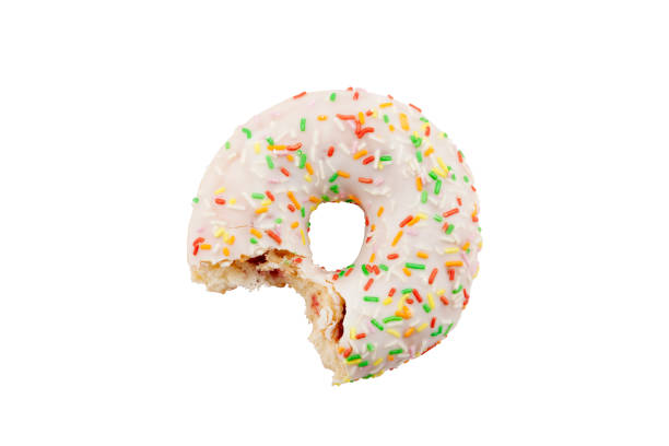Bitten donut with colorful sprinkles isolated on white with clipping path