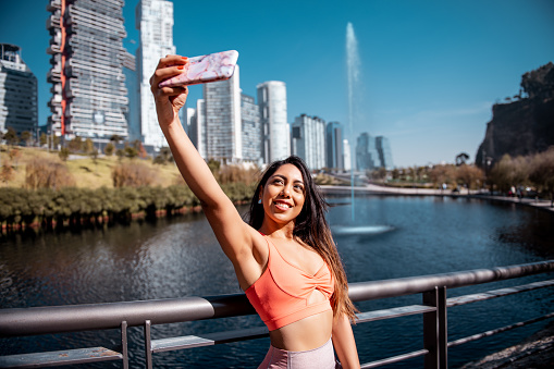 Sporty woman taking a selfie