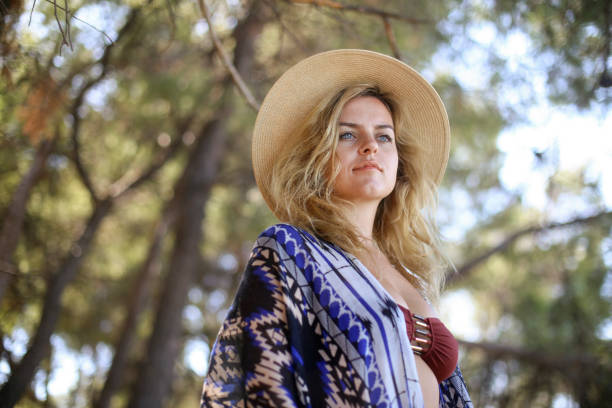 istock Young woman in nature 1203134686