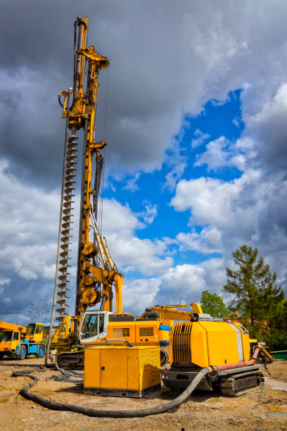 istock Industrial drilling machine at the road construction site 1203134886