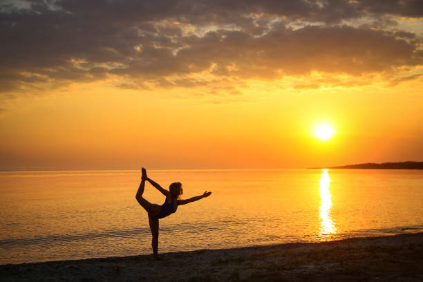 istock Yoga by the sea 1203134983