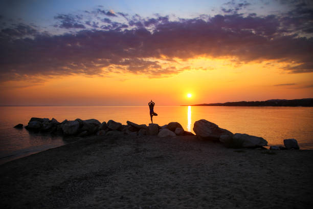 istock Yoga by the sea 1203135557