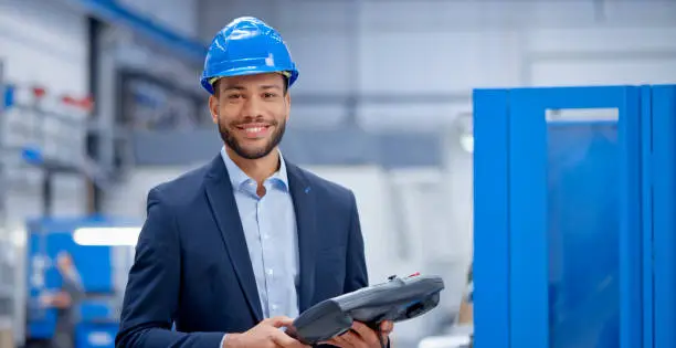 Photo of Engineer with industrial remote control