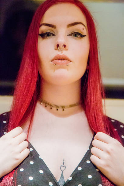 istock One woman with red hair 1203139955
