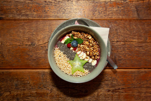 istock Healthy vegan bowl on wooden table 1203143619