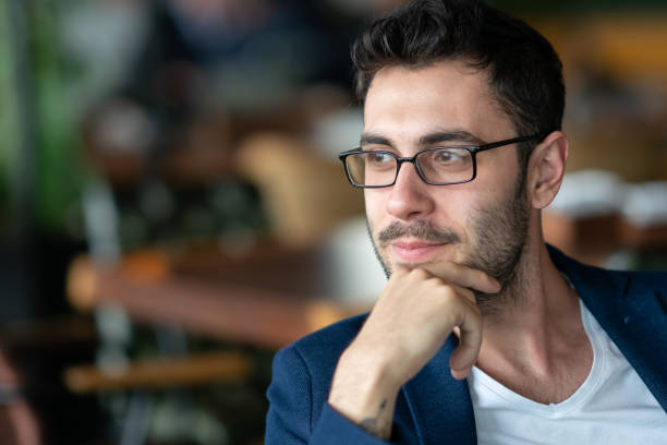 istock Portrait of a young man  with glasses 1203145977