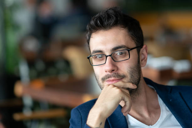 istock Portrait of a young man  with glasses 1203145979