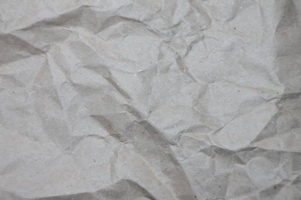 istock Abstract crumpled gray paper highlights for decorative design 1203147268