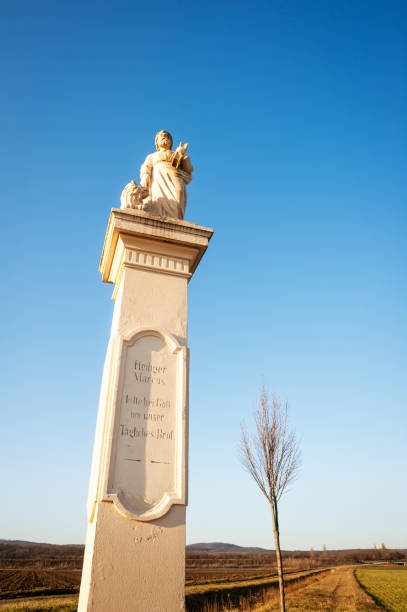 istock Column with saint marcus statue in burgenland 1203153333